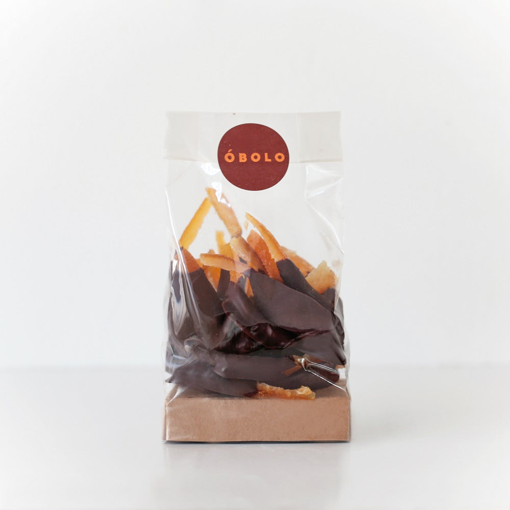 Naranjas bañadas con chocolate negro 70% cacao en envase transparente